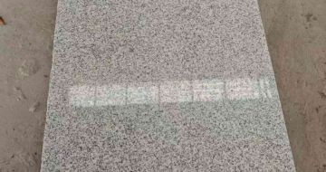 东莞芝麻白光面毛板