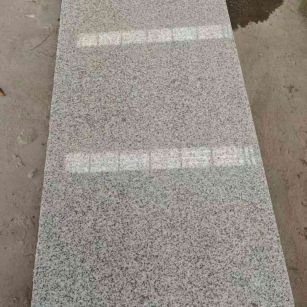 东莞芝麻白光面毛板