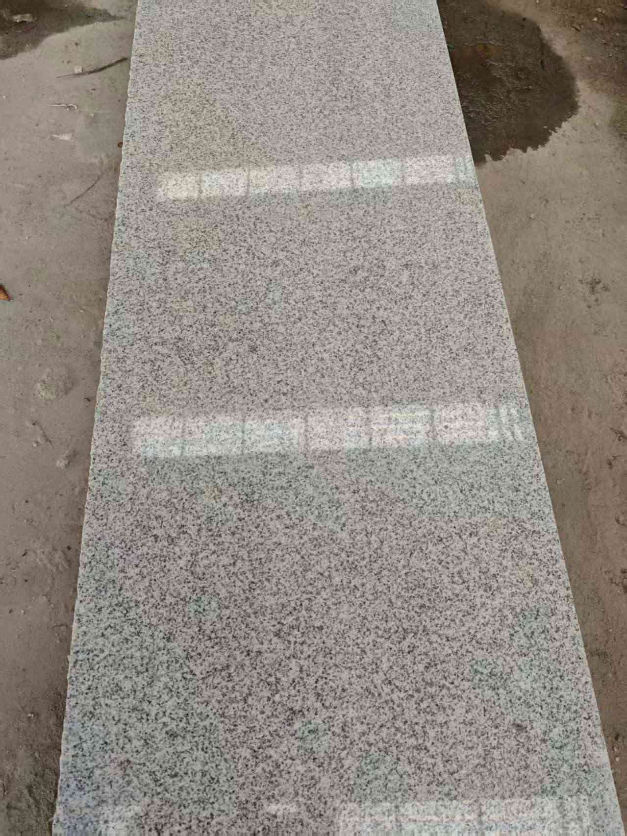 东莞芝麻白光面毛板